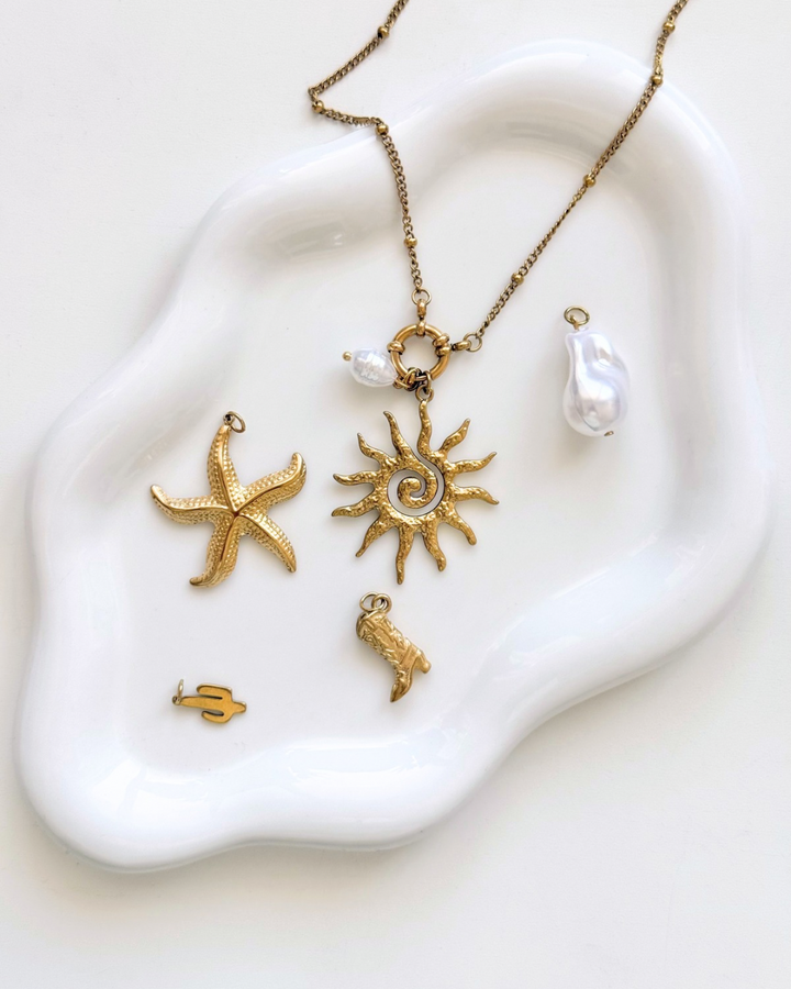 Collier anneau à breloques